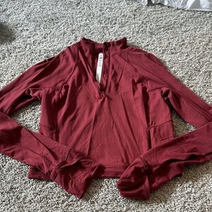 Women's Red Lululemon half Zip fitted size 8